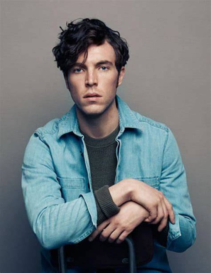Tom Hughes Biography, Age, Height, Wife, Net Worth, Family